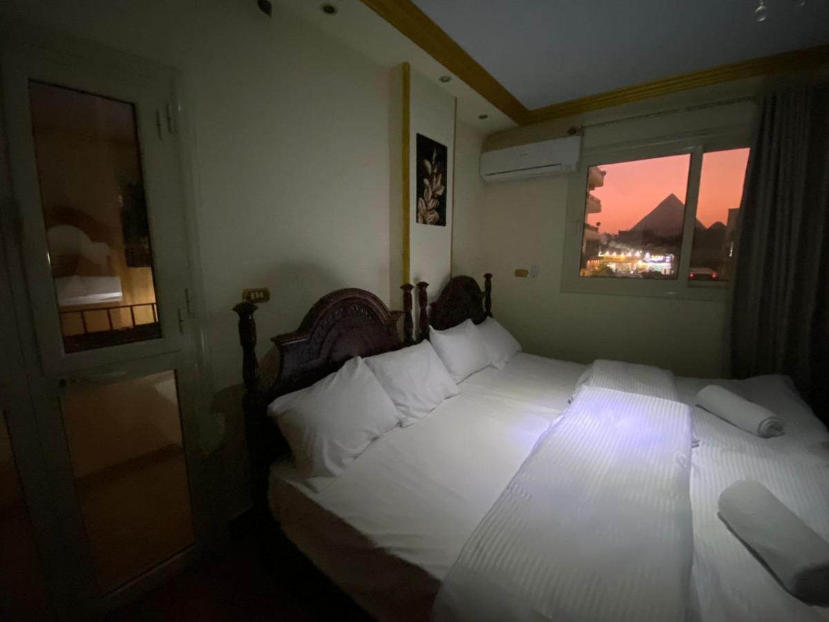 Hotel Asma Pyramids View à Kafret el-Gabal Extérieur photo