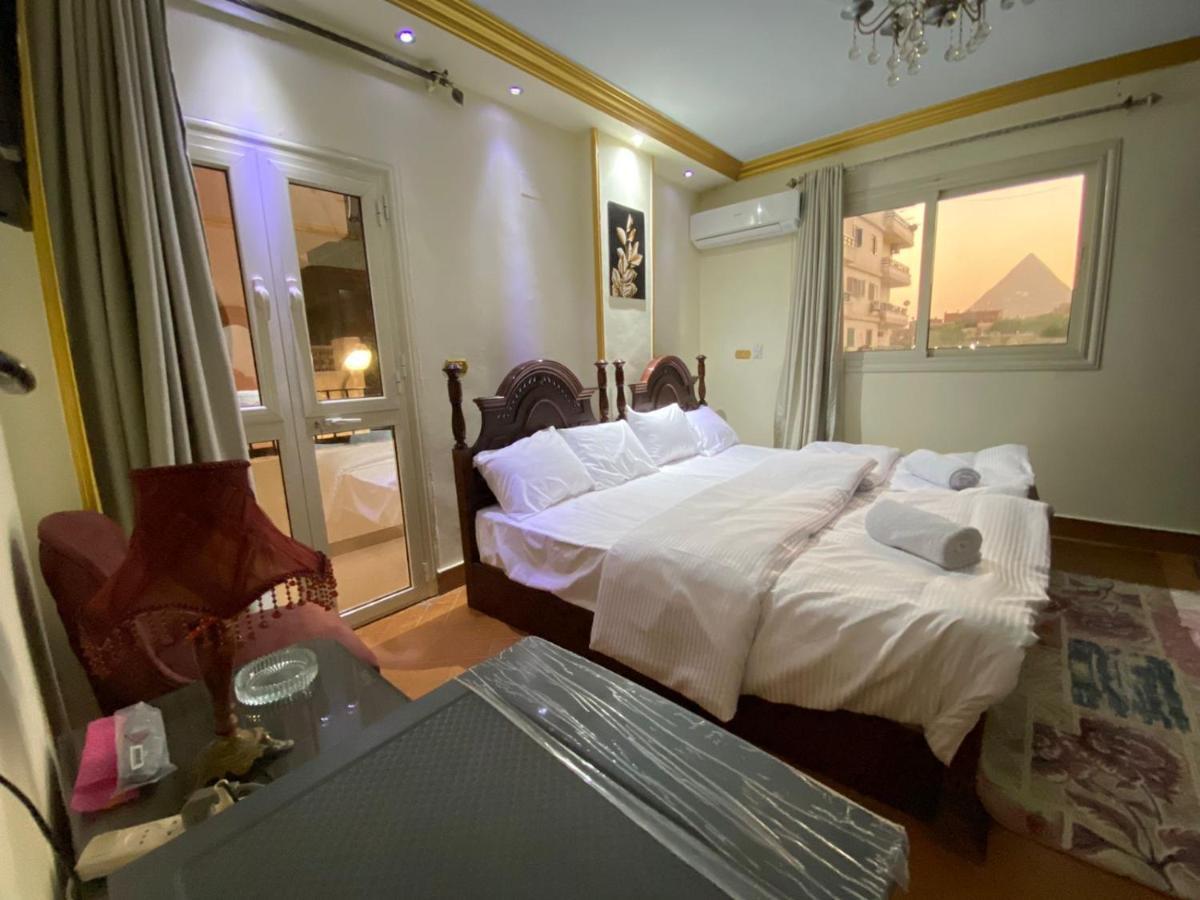 Hotel Asma Pyramids View à Kafret el-Gabal Extérieur photo
