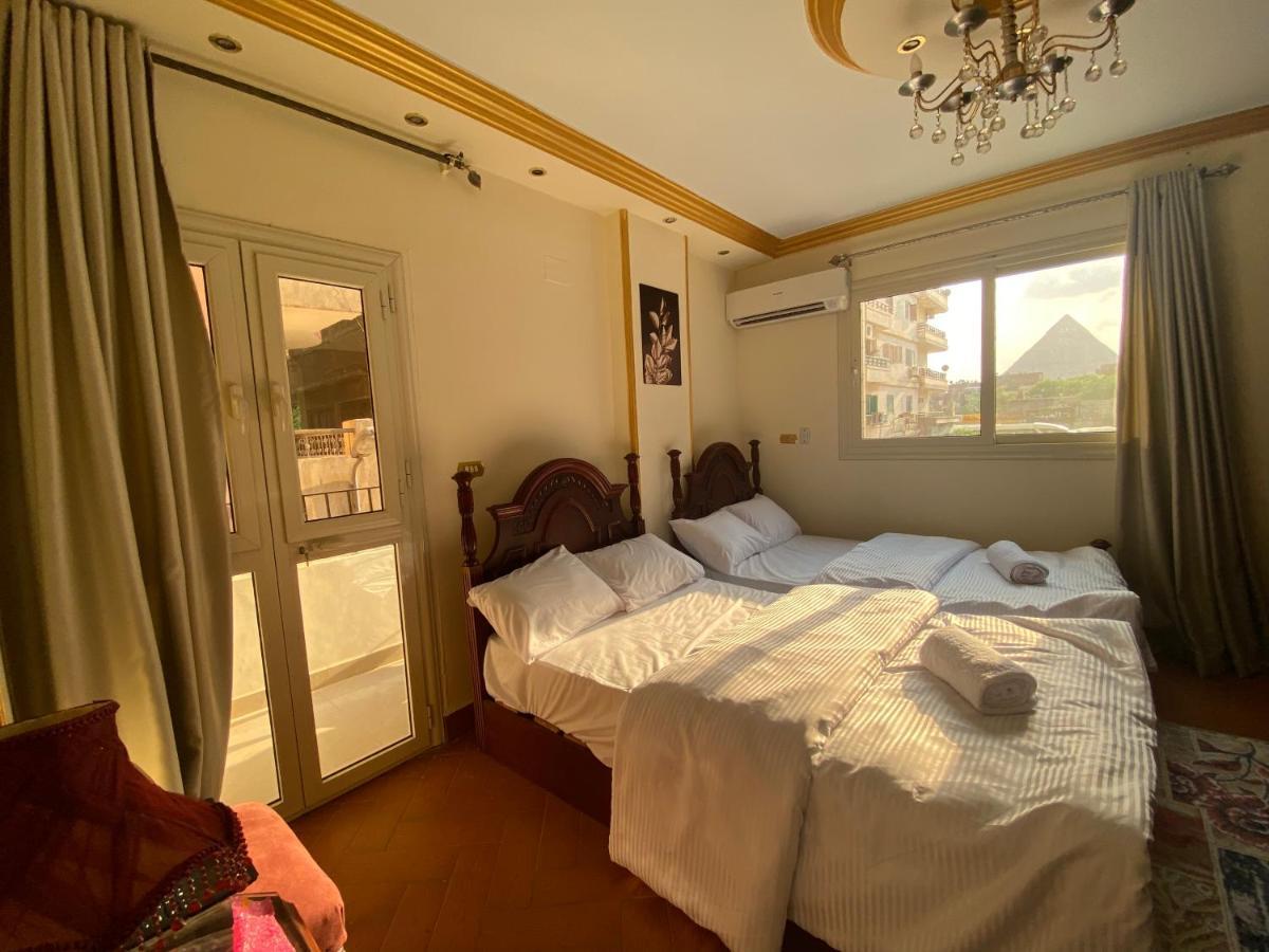 Hotel Asma Pyramids View à Kafret el-Gabal Extérieur photo
