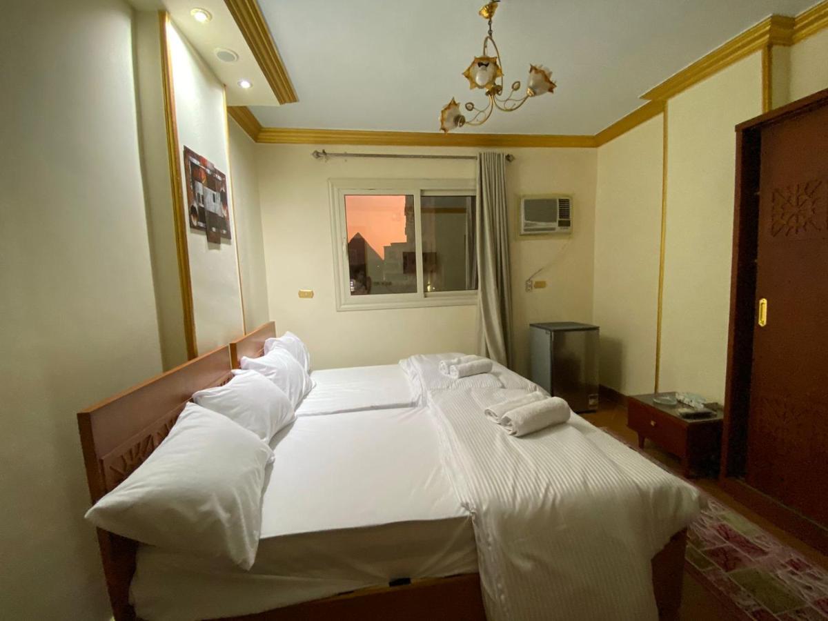 Hotel Asma Pyramids View à Kafret el-Gabal Extérieur photo