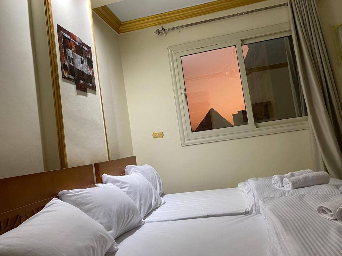 Hotel Asma Pyramids View à Kafret el-Gabal Extérieur photo