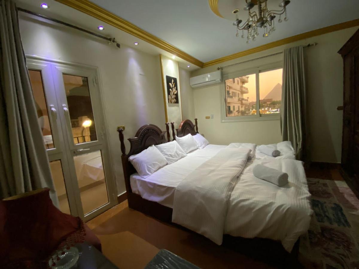 Hotel Asma Pyramids View à Kafret el-Gabal Extérieur photo