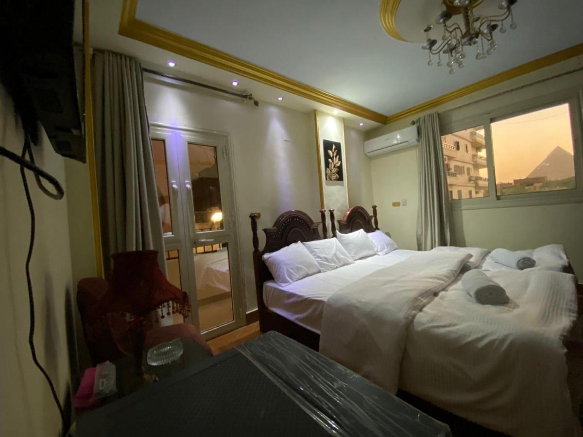 Hotel Asma Pyramids View à Kafret el-Gabal Extérieur photo
